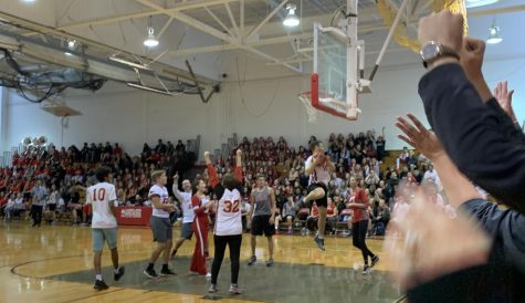 Students cheered on staff and student athletes during the pep rally basketball game. 