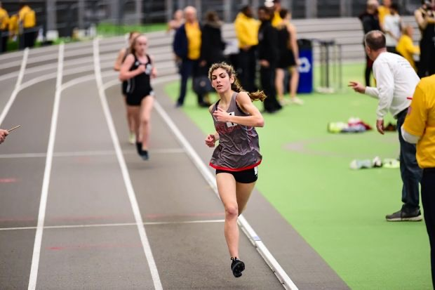Angelina Perezs success didnt end in the fall season - here she is pictured in the lead at an indoor meet.