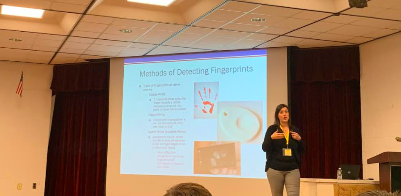 Ms. Hayes discussed with UPAL students the different methods for detecting fingerprints. 