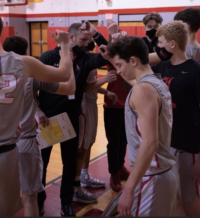 Boys basketball had a winning record and overcame many obstacles, including shutdowns from COVID. 