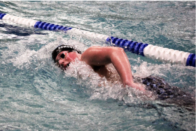 Owen Schouten broke two school record in boys swimming both the 200 IM and the 100 free.