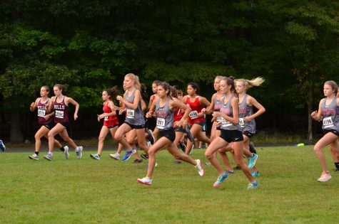 Boys and girls cross country were a force to be reckoned with this year. Pictured here: The girls team starting strong at the start of a meet.