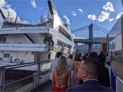 Seniors boarding  the Timeless yacht to sail through New York for prom.