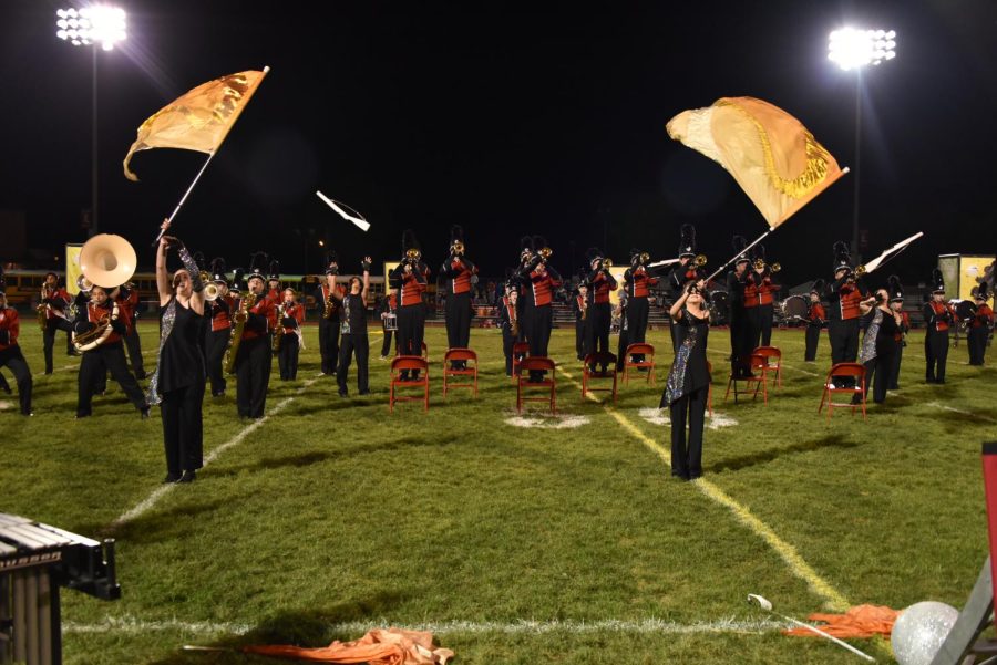 Color+guard+members+performed+with+the+Lancer+Band+on+the+LRHS+field+during+one+of+their+fall+competitions.