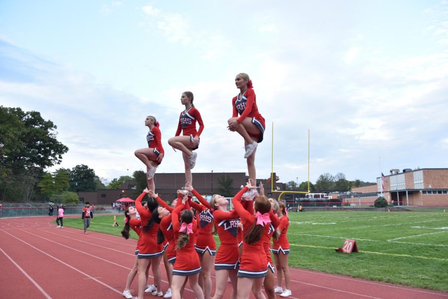 Working as team, the cheer squad rocked the sidelines.