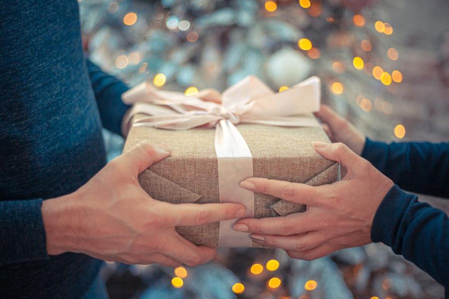 Gift giving spreads joy and cheer around the holiday season, and gift receiving brings feelings of love and belonging.