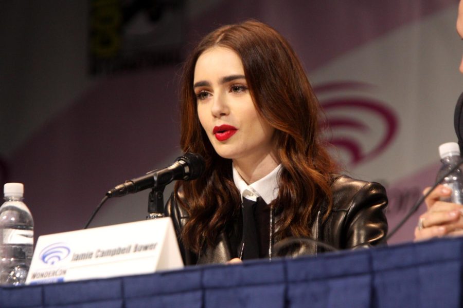 Lily Collins, star of Emily in Paris, speaking at the 2013 WonderCon at the Anaheim Convention Center in Anaheim, California.