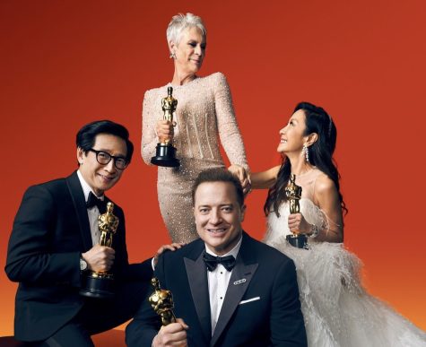 Brendan Fraser, Jamie Lee Curtis, Ke Huy Quan, and Michelle Yeoh pose for the camera together celebrating their wins.