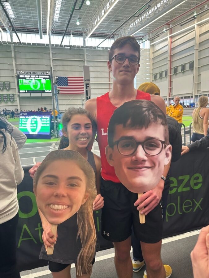 Morgan+Uhlhorn+and+Owen+Horevay+were+surprised+with+personal+fatheads+made+by+their+teammates+for+some+extra+special+cheering+on+during+their+Meet+of+Champs+races.