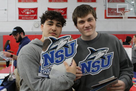 Juniors Eydan Linares and Patrick Sherlock looking into NSU thanks to Lakelands college fair.