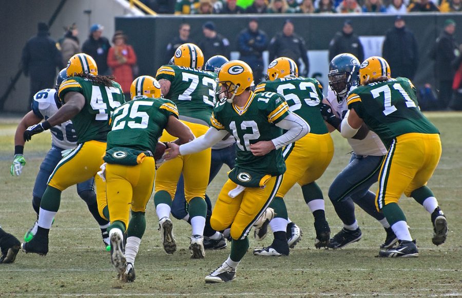 Aaron+Rodgers+hands+off+the+ball+to+Ryan+Grant+during+a+game+against+the+Seahawks.
