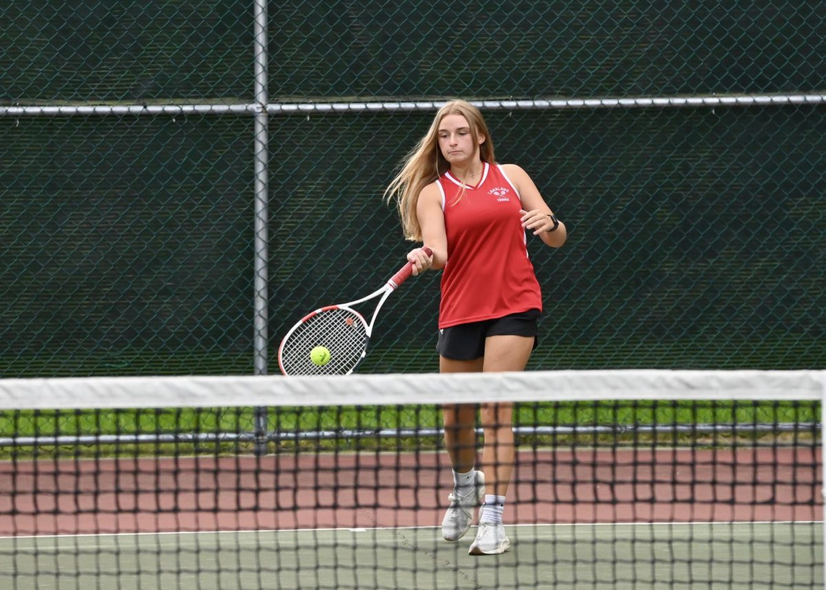 Junior Katelyn Eviner strikes the ball during a game.

(LRHS)