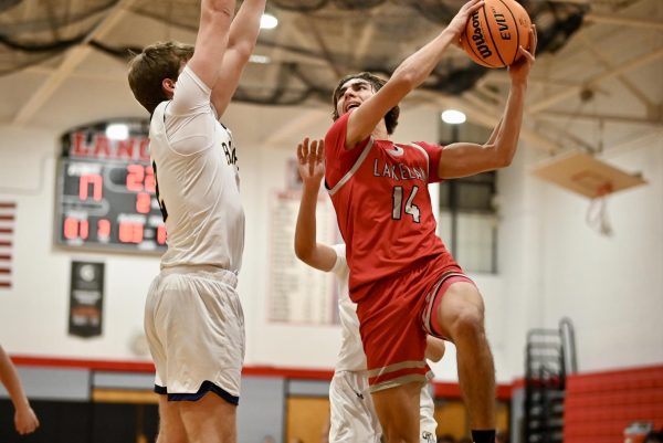 Captain Tyburski goes in for a shot in the season's first game against Ramsey. 

(LRHS)