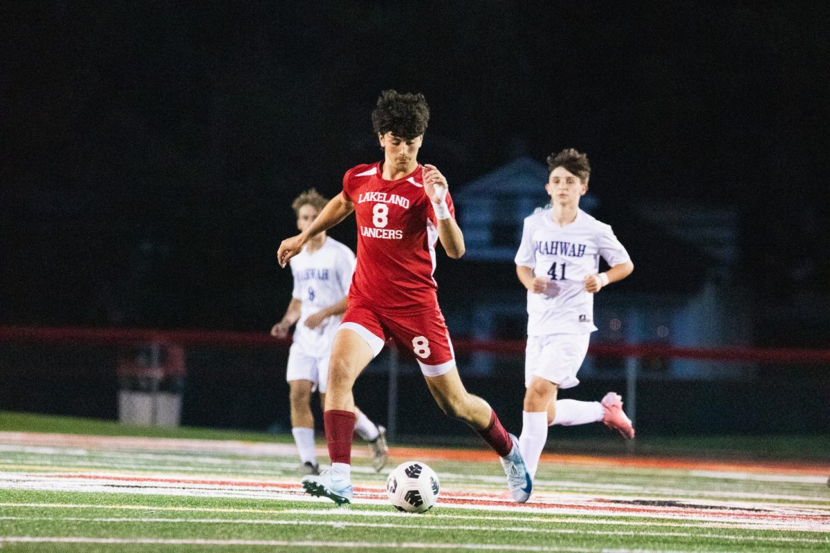 Pietro Seela prepares to pass the ball to his teammate.

(LRHS)