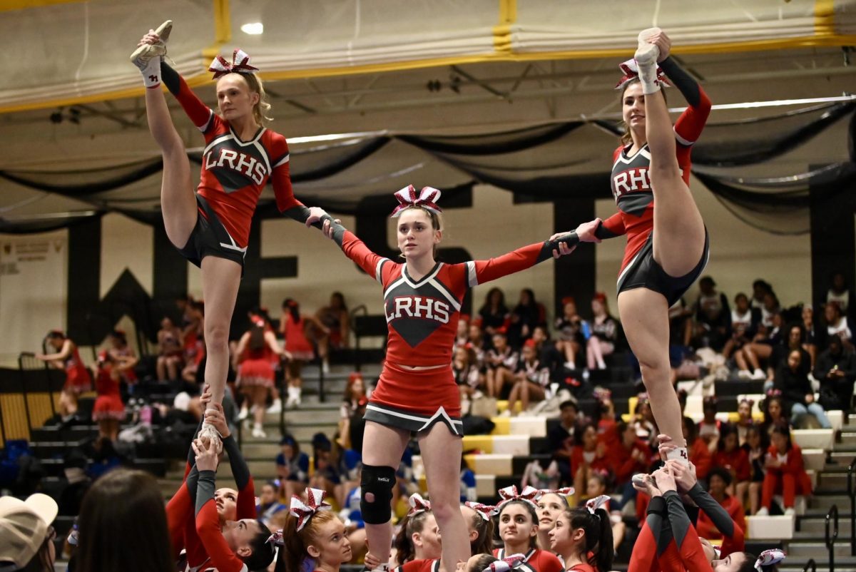 LRHS cheerleaders nailing a stunt at one of their many comps. 

(LRHS)