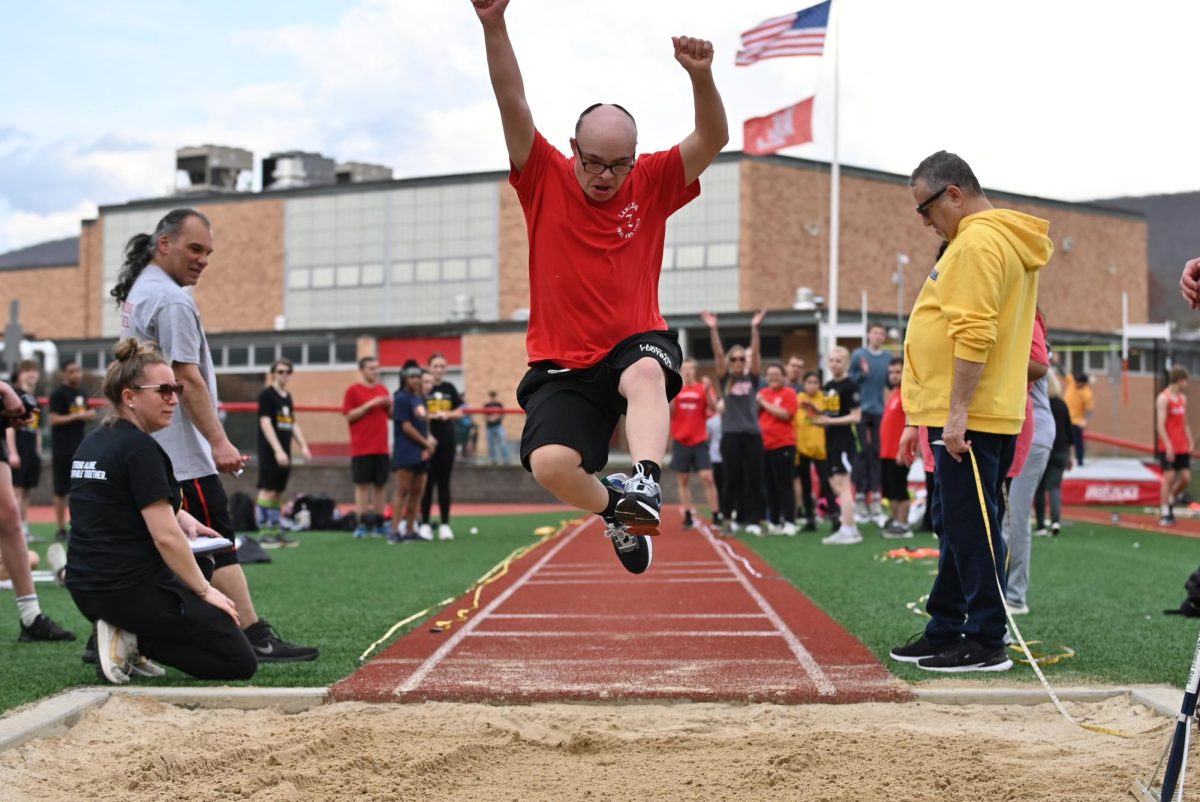 One of Lakeland's athletes, Declan Buonomo, doing the long jump.

(LRHS)