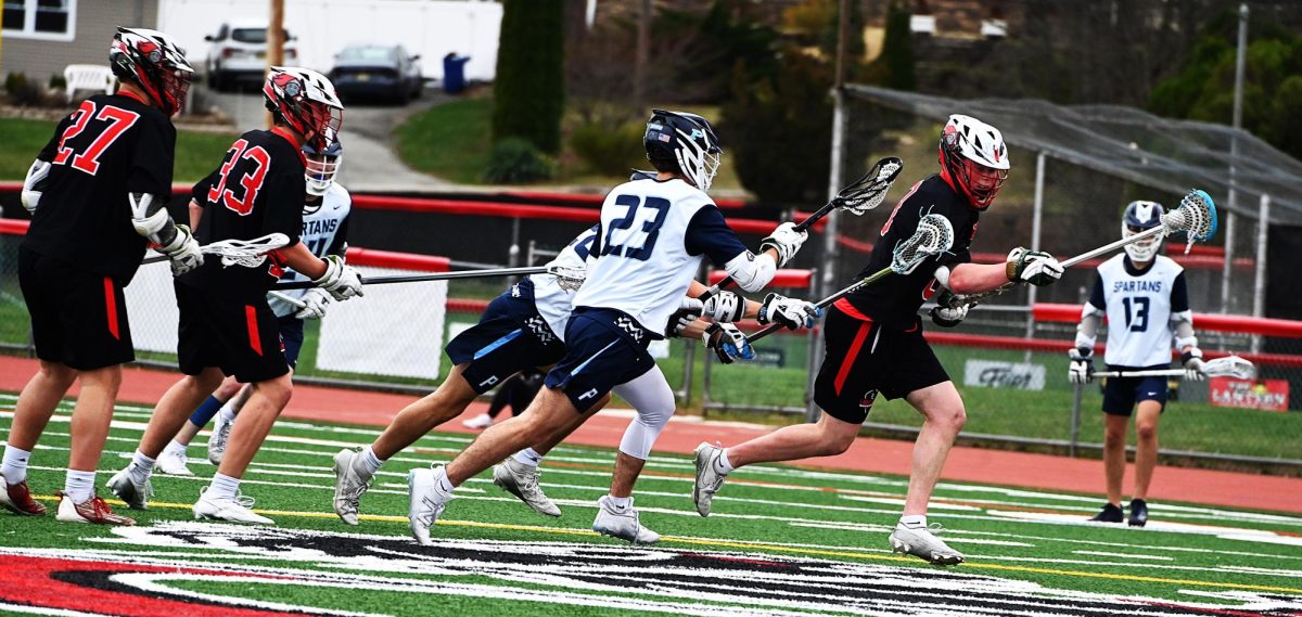 Boys Lakeland lacrosse team playing with everything that got to win.

(LHRS)