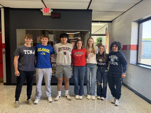 Several seniors wearing the shirts of the universities they plan to attend.

(LRHS)