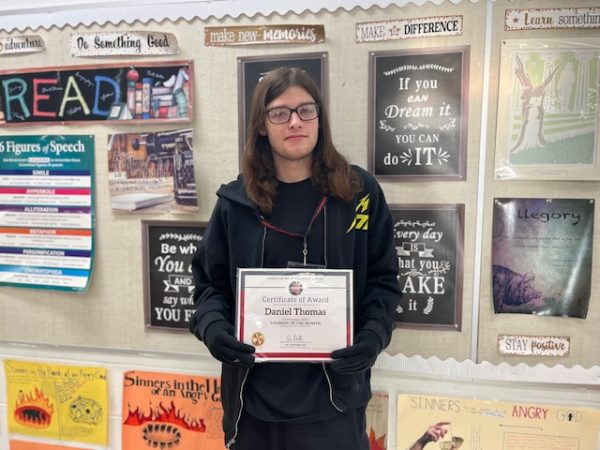 Senior Daniel Thomas humbly accepts his award as Student of the Month for business. 

Photo courtesy of Ms. Laura Fucilli 