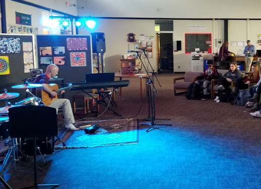 Mr. Dave Bochkay performs at the LRHS Coffee House showcasing his guitar playing skills. 
