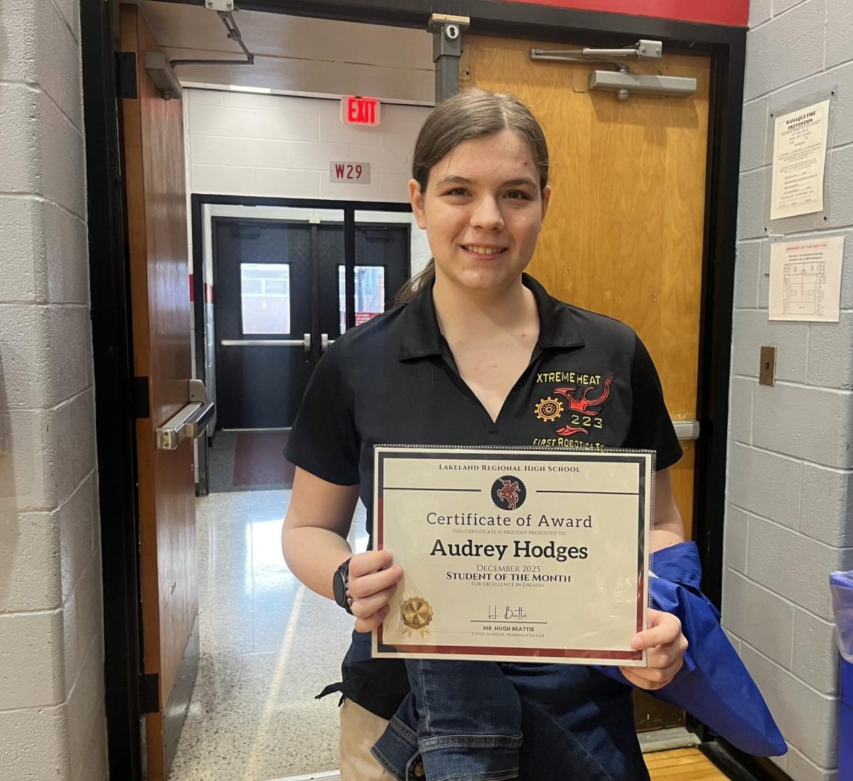 Junior Audrey Hodges humbly accepts her award as Student of the Month for English. 

Photo courtesy of Ava Radice 