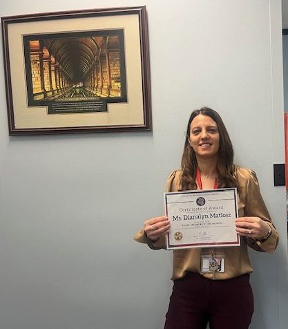 Ms. Diana Matlosz demonstrates her dedication to her students. 

Photo courtesy of Ms. Dawn Phillips